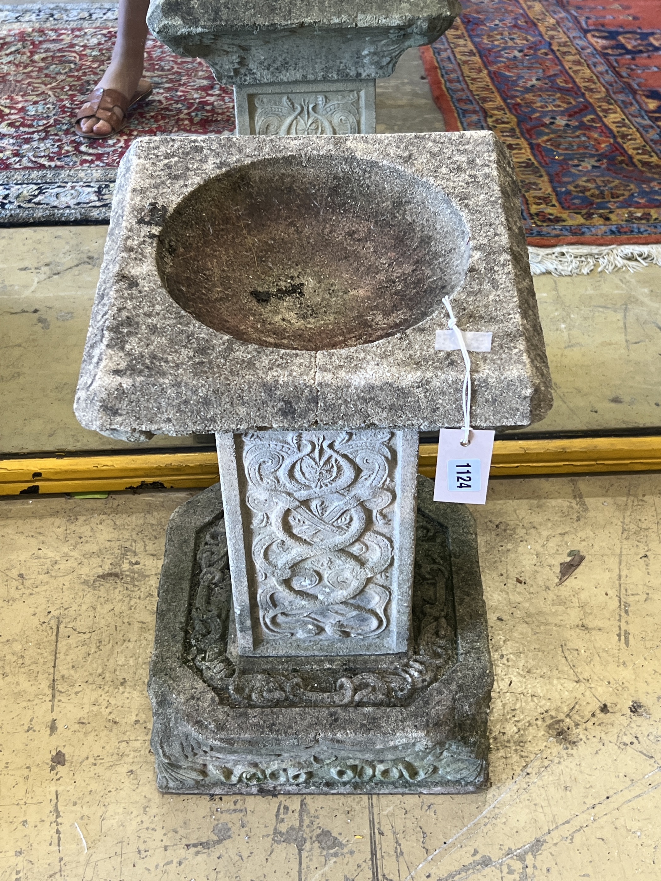 A square reconstituted stone garden bird bath, width 32cm, height 52cm